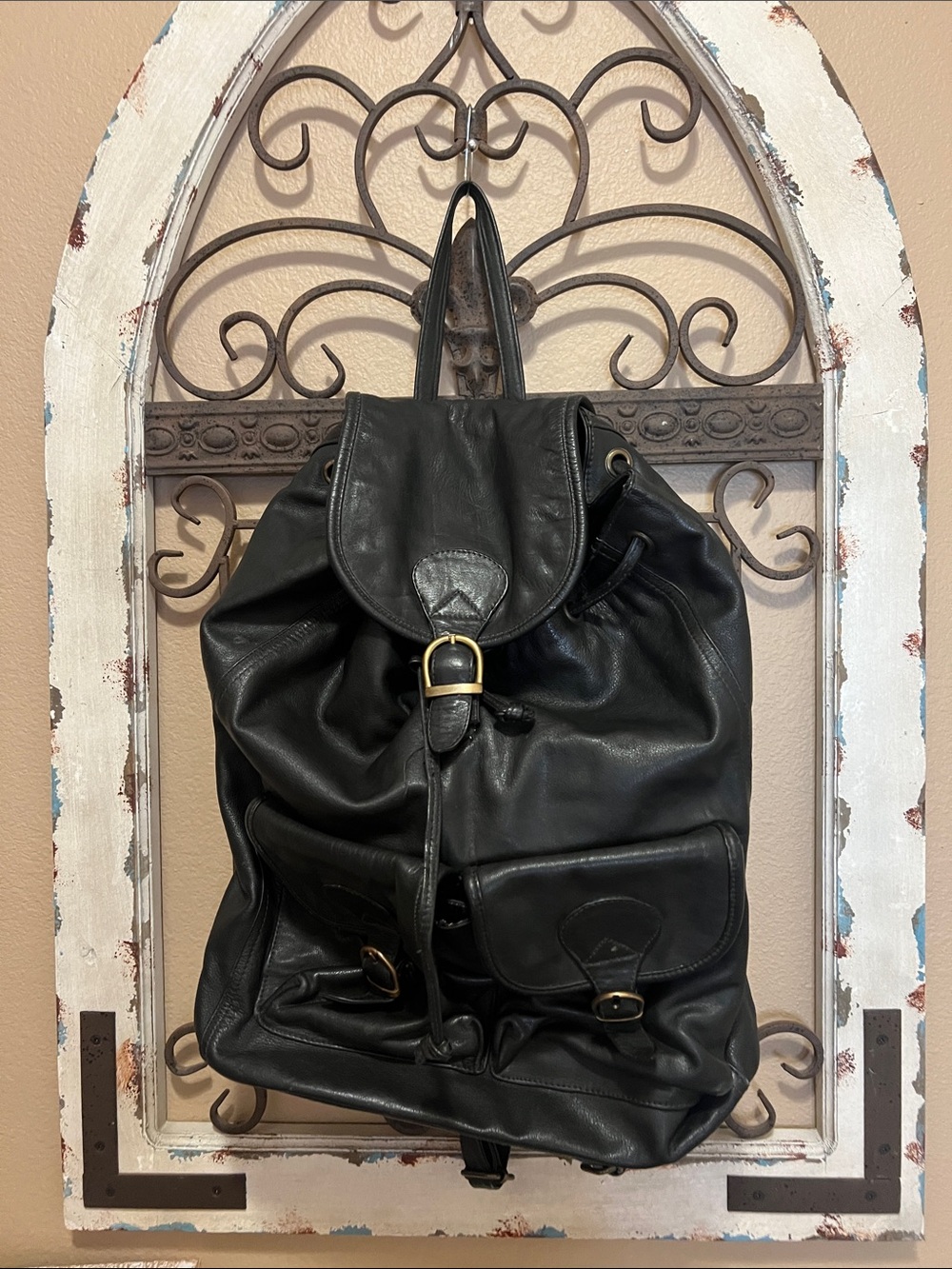 Classic Black Leather Drawstring Backpack with Buckle Accents